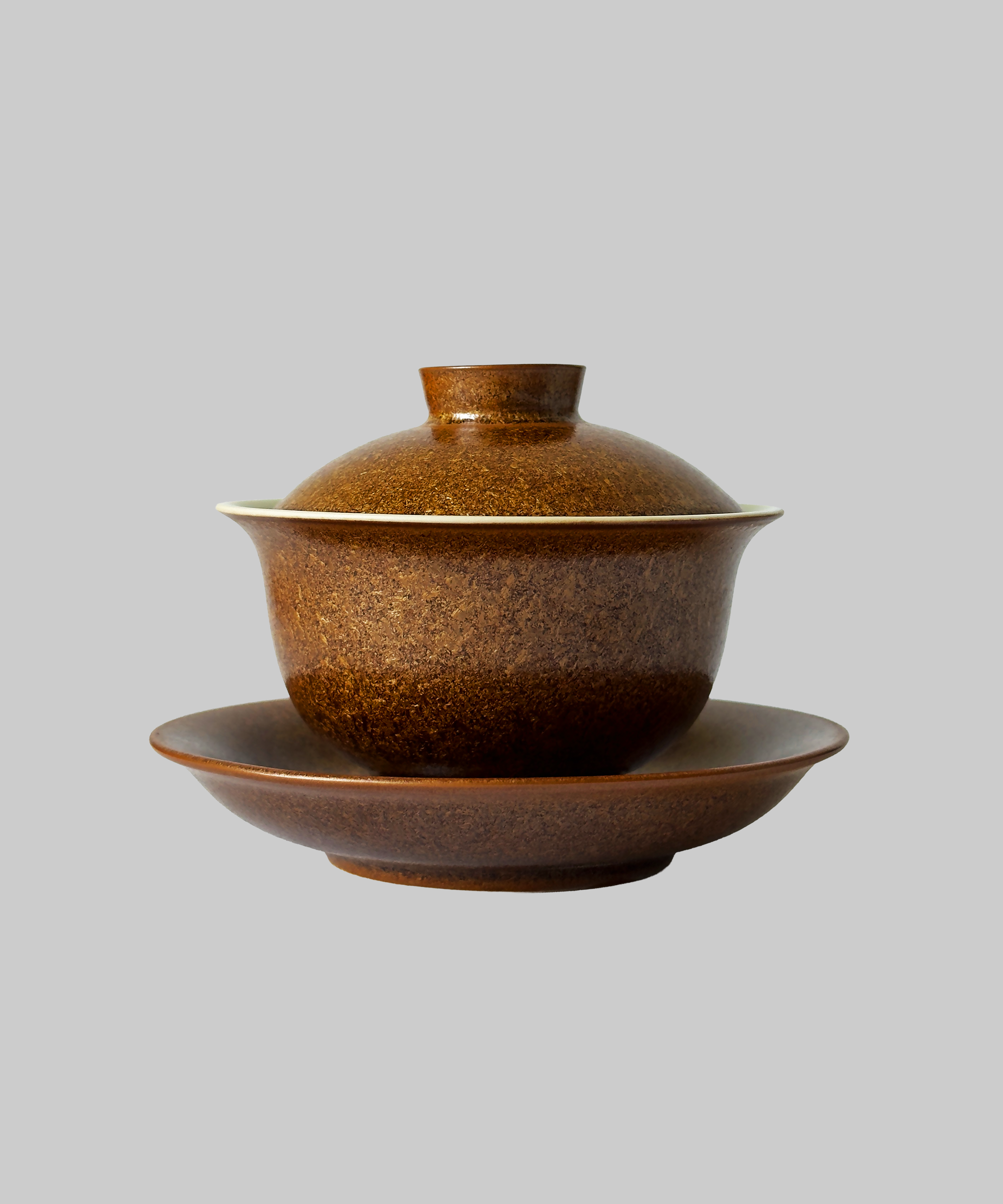 гайвань коричнево-золота. Чайна Chaguan - чай і посуд для чаювань і чайних церемоній.