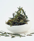 китайській зелений чай хуан шань мао фен